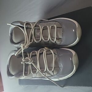 Visibly worn Jordan 11 grey and white good condition